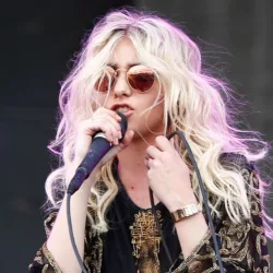 Taylor Momsen (R) and Mark Damon of The Pretty Reckless perform at MGM Resorts Village on September 20^ 2014 in Las Vegas^ Nevada.