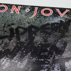 Bon Jovi music album on vinyl record LP disc. 'Slippery When Wet'