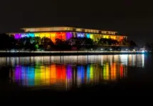 The Kennedy Center illuminated in a rainbow of colors in recognition of the upcoming Kennedy Center Honors. Washington^ DC / USA - November 19^ 2019