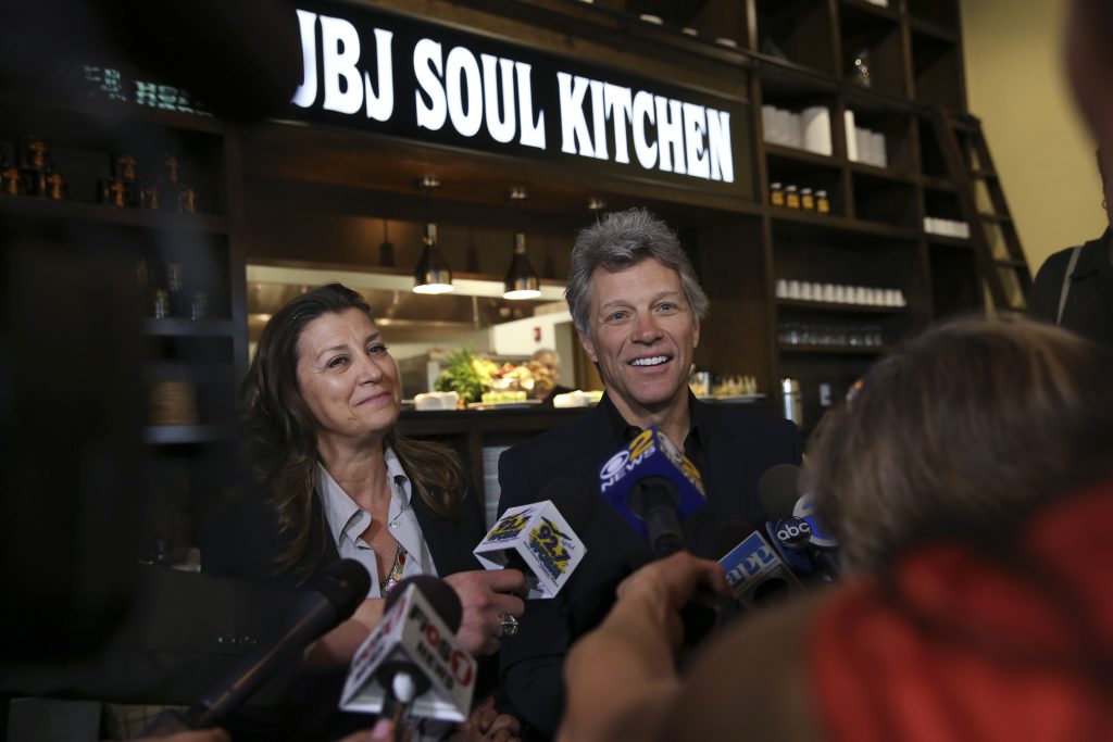 rock star and philanthropist jon bon jovi listens to a question as he stands with his wife dorothea hurley in jon bon jovi soul foundations soul kitchen - Jon Bon Jovi Soul Kitchen rock star and philanthropist jon bon jovi listens to a question as he stands with his wife dorothea hurley in jon bon jovi soul foundations soul kitchen - Jon Bon Jovi Soul Kitchen