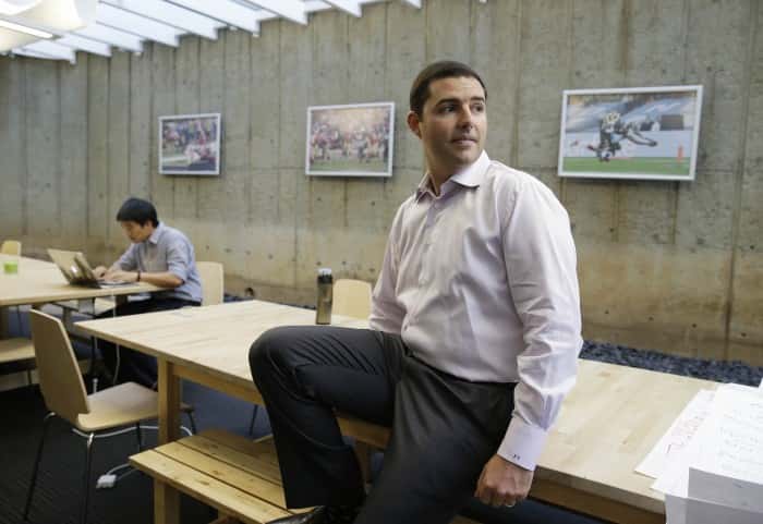 In this photo taken Thursday, Sept. 11, 2014, San Francisco 49ers CEO Jed York poses at the offices of VenueNext in Palo Alto, Calif. If York realizes his vision, Levis Stadium will channel Silicon Valleys ingenuity to become known as a technology temple programmed to pamper and connect fans who are more accustomed to being corralled in congested venues with little or no Internet access. (AP Photo/Eric Risberg)