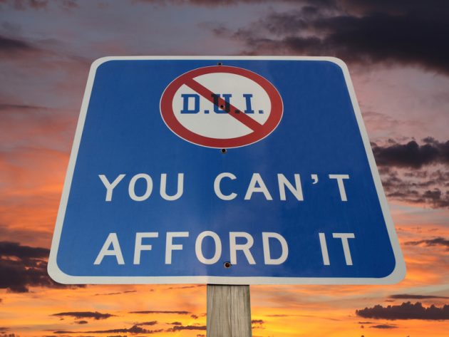 dui-you-cant-afford-it-warning-sign-with-sunset-sky