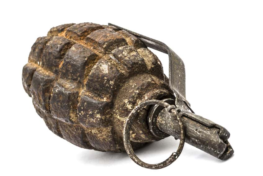 old-combat-grenade-isolated-on-a-white-background