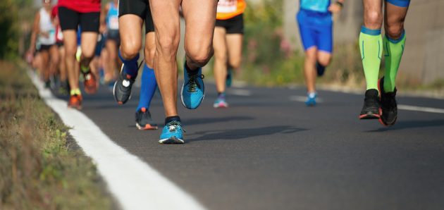 marathon-running-race-people-feet-on-city-road