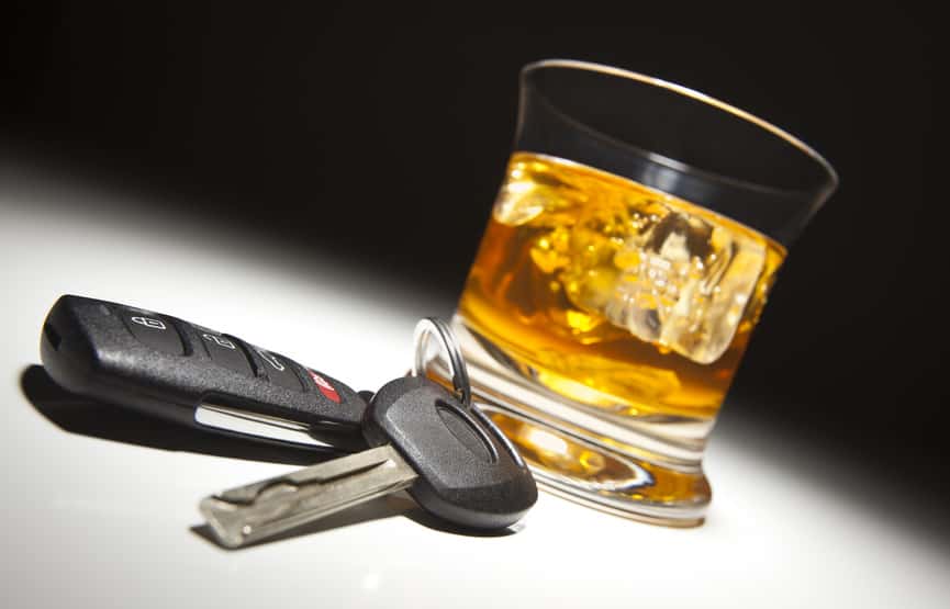 alcoholic-drink-and-car-keys-under-spot-light