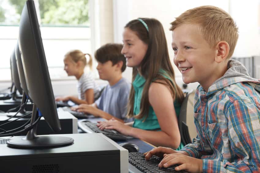 group-of-elementary-school-children-in-computer-class