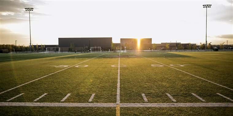 football-field-sunset-empty-high-school-stock-today-main-180824_cb40e982825db4d09ee4af402b078163-fit-760w
