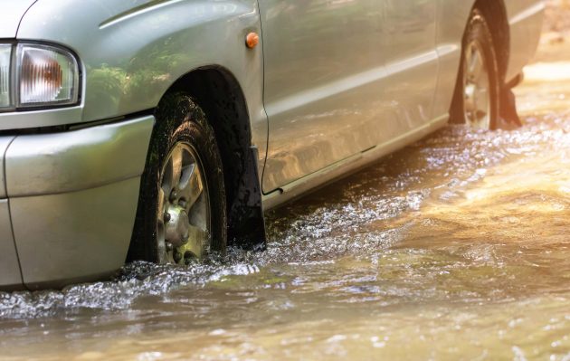 car-driving-through-flood-waters