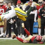 APTOPIX NFC Championship Packers 49ers Football: Green Bay Packers tight end Marcedes Lewis, top, is tackled by San Francisco 49ers middle linebacker Kwon Alexander during the first half of the NFL NFC Championship football game Sunday, Jan. 19, 2020, in Santa Clara, Calif. (AP Photo/Ben Margot)