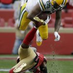 APTOPIX NFC Championship Packers 49ers Football: Green Bay Packers tight end Marcedes Lewis flips over San Francisco 49ers middle linebacker Kwon Alexander during the first half of the NFL NFC Championship football game Sunday, Jan. 19, 2020, in Santa Clara, Calif. (AP Photo/Marcio Jose Sanchez)