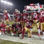 NFC Championship Packers 49ers Football: San Francisco 49ers players celebrate after cornerback Richard Sherman, bottom center, intercepted a pass against the Green Bay Packers during the second half of the NFL NFC Championship football game Sunday, Jan. 19, 2020, in Santa Clara, Calif. The 49ers won 37-20 to advance to Super Bowl 54 against the Kansas City Chiefs. (AP Photo/Tony Avelar)