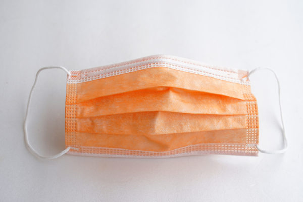orangehygienicfacemask-conceptforcolorfulprotectivemasktoprevent