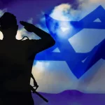 Israeli soldier with rifle^ silhouette on the background sky with smoke and flag of Israel. Concept: War^ IDF^ Defense