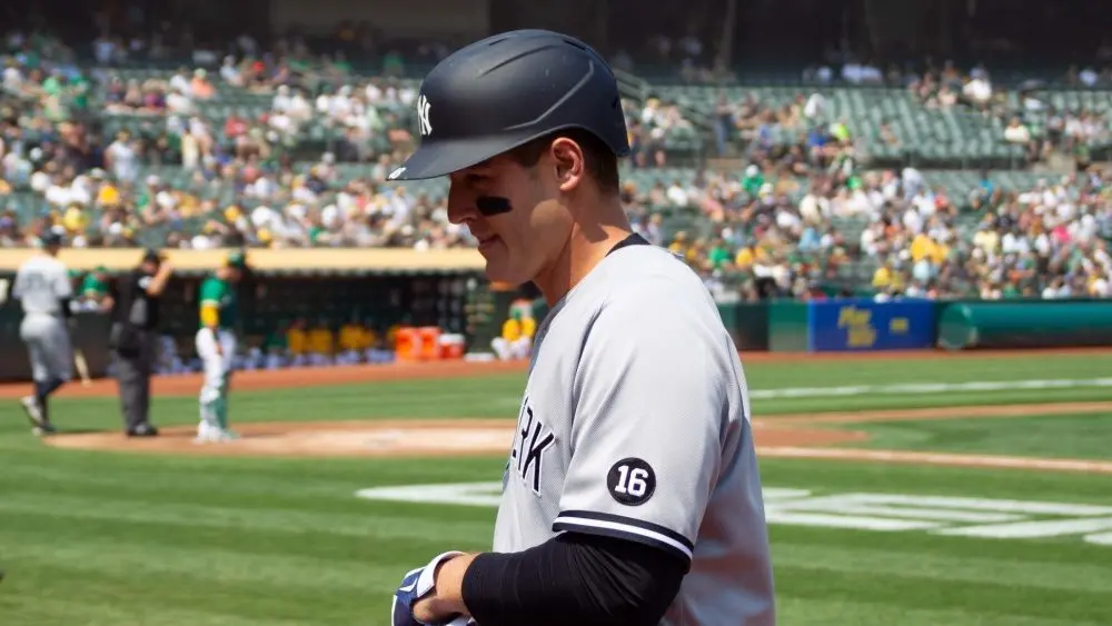 New York Yankees' Anthony Rizzo #48 walks back to the dugout after grounding out during a game against the Oakland Athletics at RingCentral Coliseum. Oakland^ California - August 28^ 2021