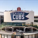 Chicago^ IL^ USA - October 9^ 2024: An aerial view of Major League Baseball's Chicago Cubs' Wrigley Field stadium in the Wrigleyville neighborhood of Chicago.