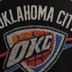 OKLAHOMA CITY THUNDER IN ALL RHINESTONES AS PATCH ON BACK OF MENS VARSITY JACKET AI-generated image / This content was generated by an Artificial Intelligence (AI) system.
