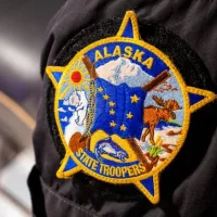 Alaska state trooper official batch icon on clothes close up Titusville^ FL^ USA - Feb. 12^ 2021