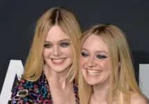 Elle Fanning & Dakota Fanning arriving at the Saint Laurent at the Palladium fashion show at the Hollywood Palladium. LOS ANGELES^ CA - FEBRUARY 10^ 2016