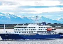 MV Hondius^ a purpose-built^ environmentally-friendly expedition cruise ship^ departs from the port of Ushuaia. Ushuaia^ Argentina - January 4 2025