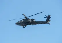Army Apache AH-64 Helicopter during the Dragoon Ride Exercise on March 22^ 2015 in Vilnius^ Lithuania. The Boeing AH-64 Apache is a four-blade^ twin-turboshaft attack helicopter. VILNIUS - MAR 22