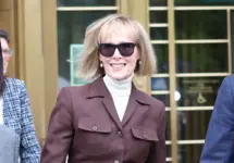 E. Jean Carroll smiles as she leaves the courtroom after a jury found former President Trump liable for sexual abuse and defamation. New York^ NY USA - May 9 2023