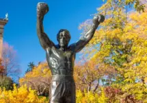 PHILADELPHIA^ PENNSYLVANIA - NOVEMBR 16^ 2016: The Rocky Balboa statue during autumn. The statue commemorates the The Rocky film series which has become a cultural icon.