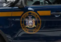 New York State Police Car. Emblem on Door of Trooper Car Manhattan^ New York^USA - November 11. 2019