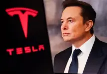 Elon Musk^ CEO of Tesla^ in a formal suit with the Tesla logo in the background. The image depicts electric vehicles^ innovations^ and tech leadership.