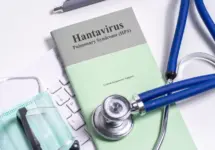 Hantavirus Pulmonary Syndrome (HPS) Critical Respiratory Support booklet with stethoscope^ mask and clinical desk setup.