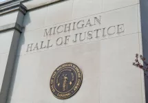 State of Michigan seal on the Michigan Hall of Justice Building; Lansing MI - May 6^ 2023