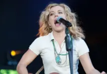 Kimberly Perry of The Band Perry performs in part of Brad Paisley's Virtual Reality Tour 2012 at Sleep Train Amphitheatre on July 26^ 2012 in Wheatland^ California.