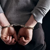 outlaws-hands-locked-in-handcuffs-14