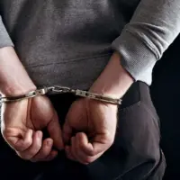 outlaws-hands-locked-in-handcuffs-37