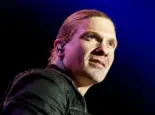 Brent Smith of Shinedown against a black and blue background at Rockstar Uproar Festival on September 25 2012 in Nampa^ Idaho.