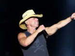 Singer Kenny Chesney performs onstage at the Runaway Country Music Fest at Osceola Heritage Park on March 19^ 2016 in Kissimmee^ Florida.