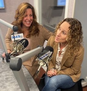 Deb Gansenberg and Lisa Sugarman in front of 1049 micropones