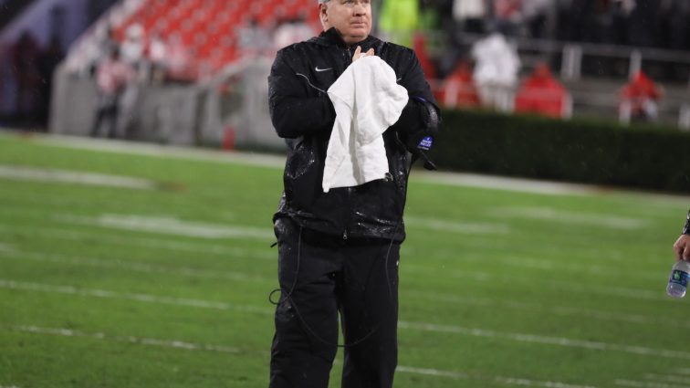 coach-with-towel