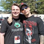 Tanner hangs with his fave, Devin Dawson, side stage at Country Summer 2019.