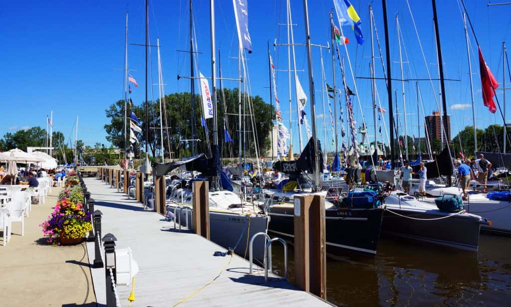 Start cup regatta is on - abstract sailboas, jetty, race, yachts