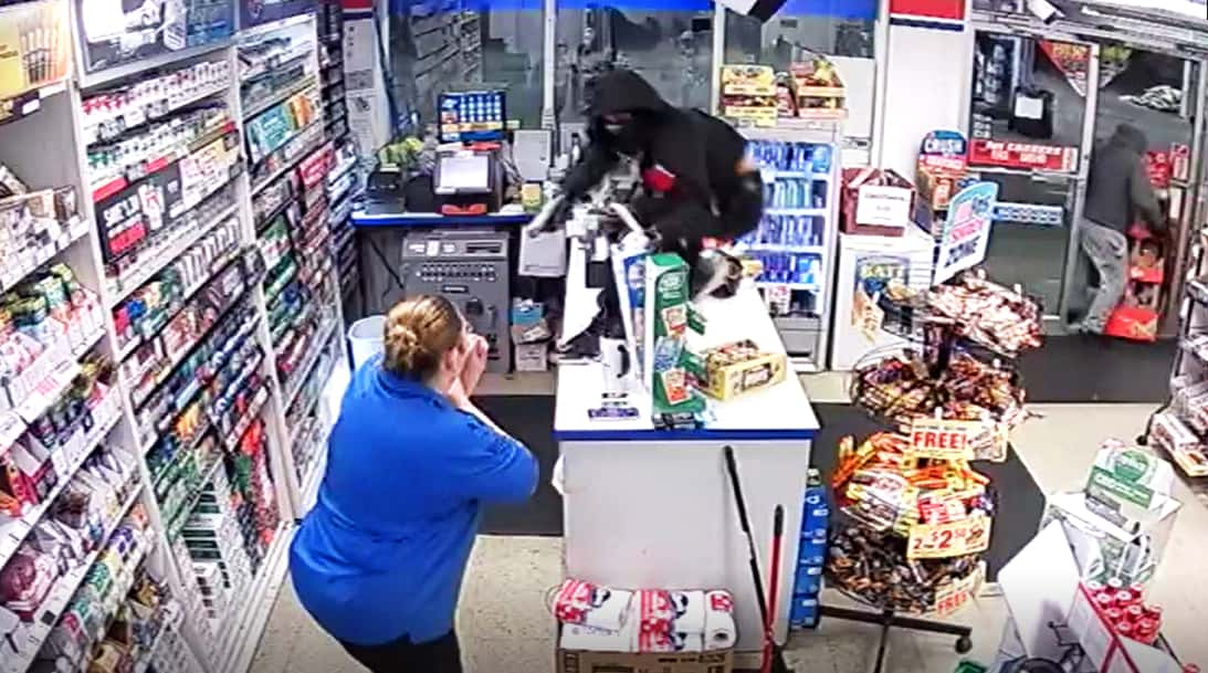 CCTV Footage Shows Customer Stealing Gunman's Loot During Armed Robbery