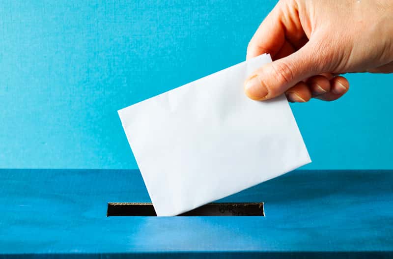 european-union-parliament-election-concept-hand-putting-ballot