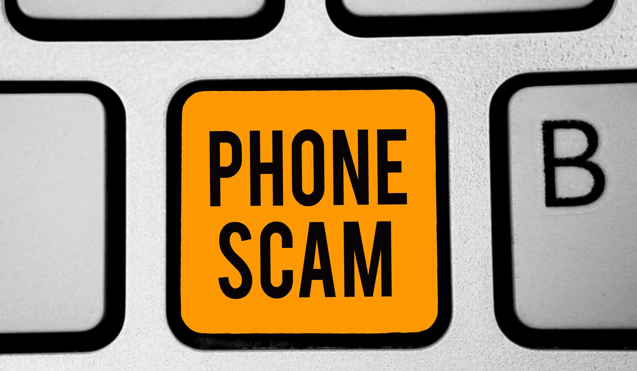 text-sign-showing-phone-scam-conceptual-photo-getting-unwanted-calls-to-promote-products-or-service-telesales-keyboard-orange-key-intention-create-computer-computing-reflection-document