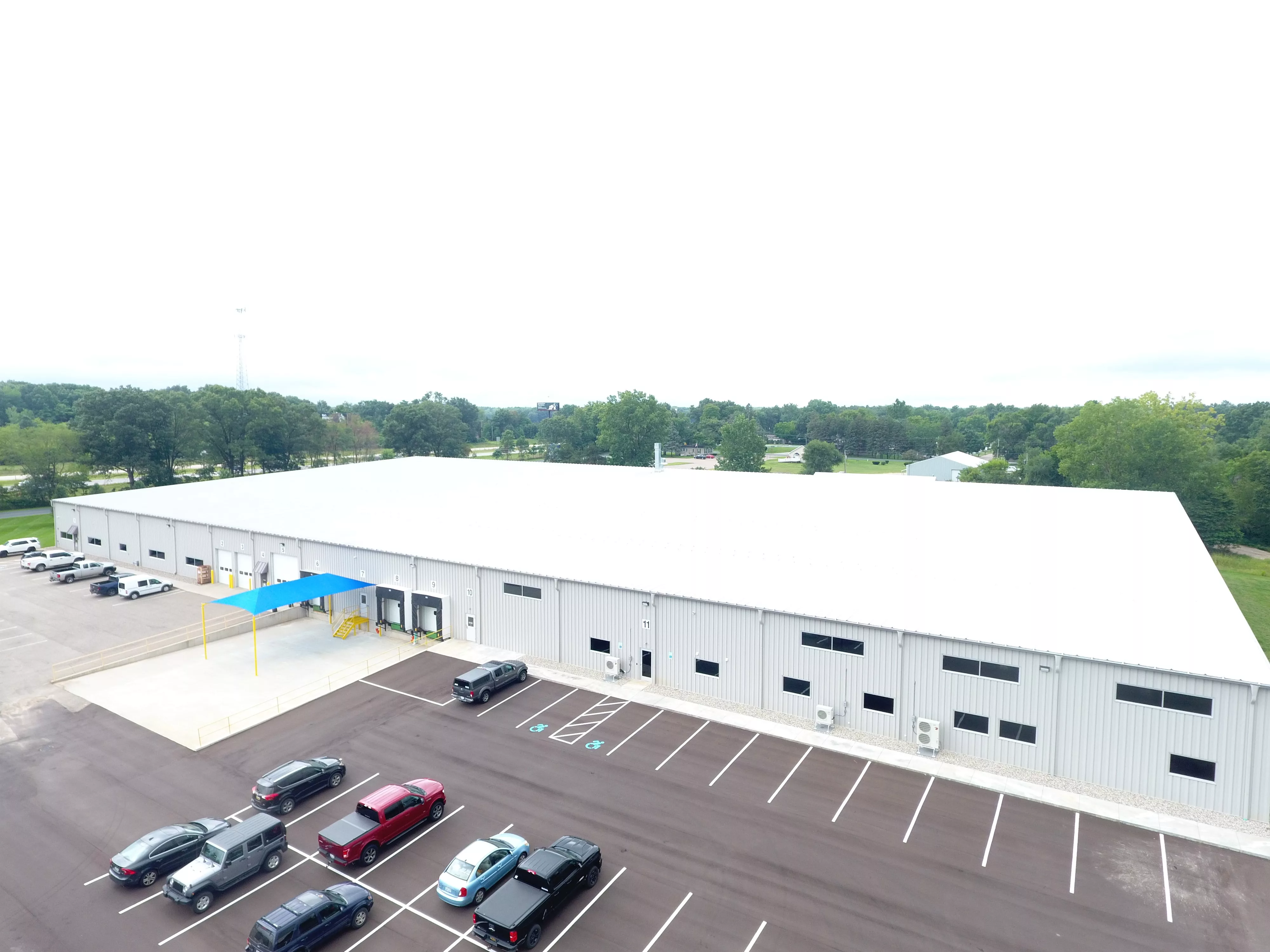 TriMation Industries Expands Mattawan Headquarters Plant, Sees Bright