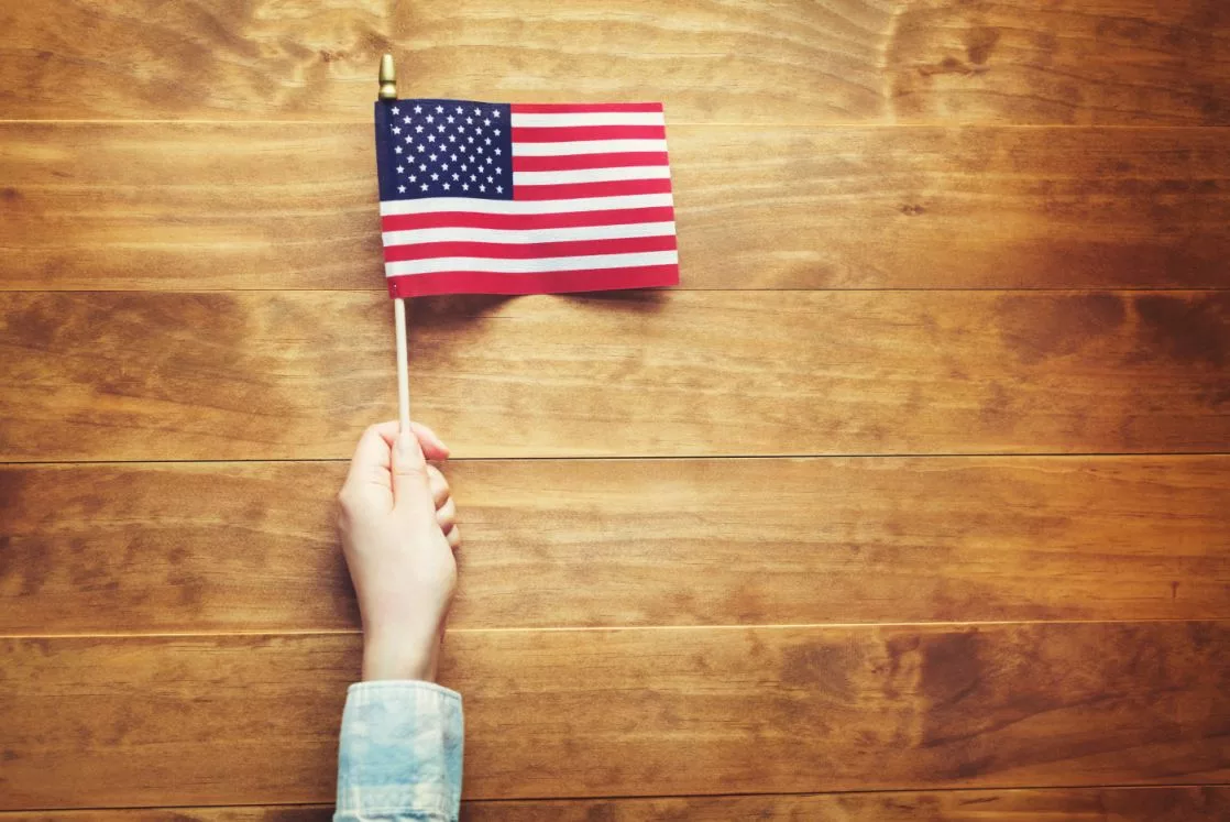 person-holding-an-american-flag