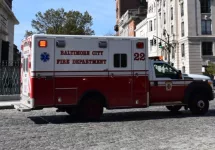 Baltimore City Fire Department ambulance driving through Mount Vernon