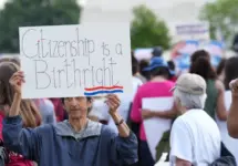 Several hundred protesters rally at the Supreme Court against president Trump's illegal executive order to make birthright citizenship conditional.Washington^ DC – May 15^ 2025: