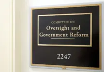 A sign at the entrance to a House Oversight Committee hearing room in Washington^ DC on July 18^ 2017. The House of Representatives is the lower chamber of the US Congress.