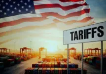 Selective focus on laptop screen displaying US high Tariffs on other countries Export and Import business and Tariff War in the world.