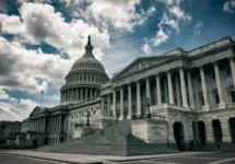 Dark and gloomy view of the deserted US Capitol Building under moody sky in Washington DC^ USA