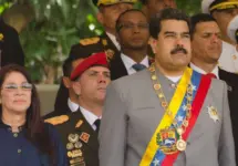 President of Venezuela^ Nicolás Maduro with First Lady Cilia Flores in a military parade. Caracas. February 1^ 2017
